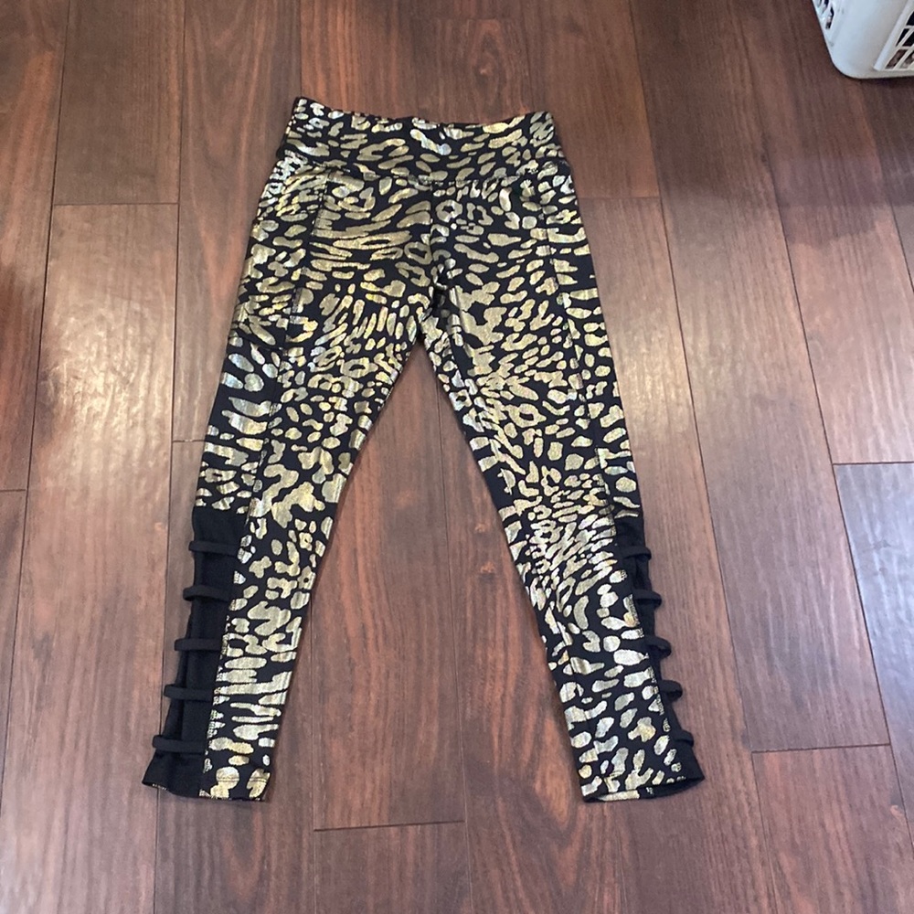 Gently used Justice CXJ girls size 14 leggings
